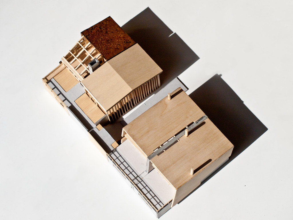 A 3D architectural model of a townhouse.