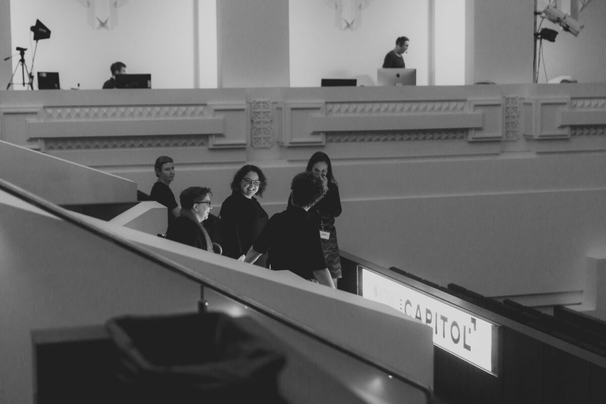 People chat after the event.