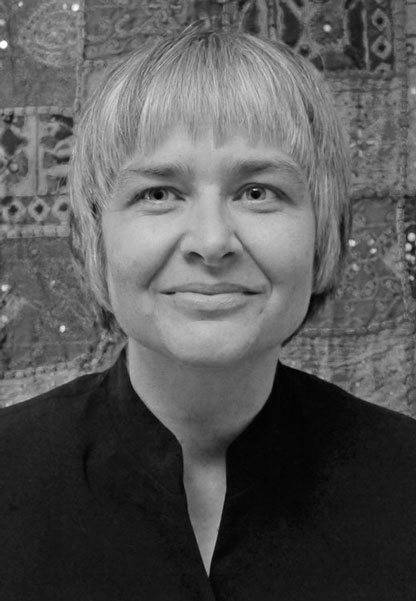 Portrait of a woman smiling.