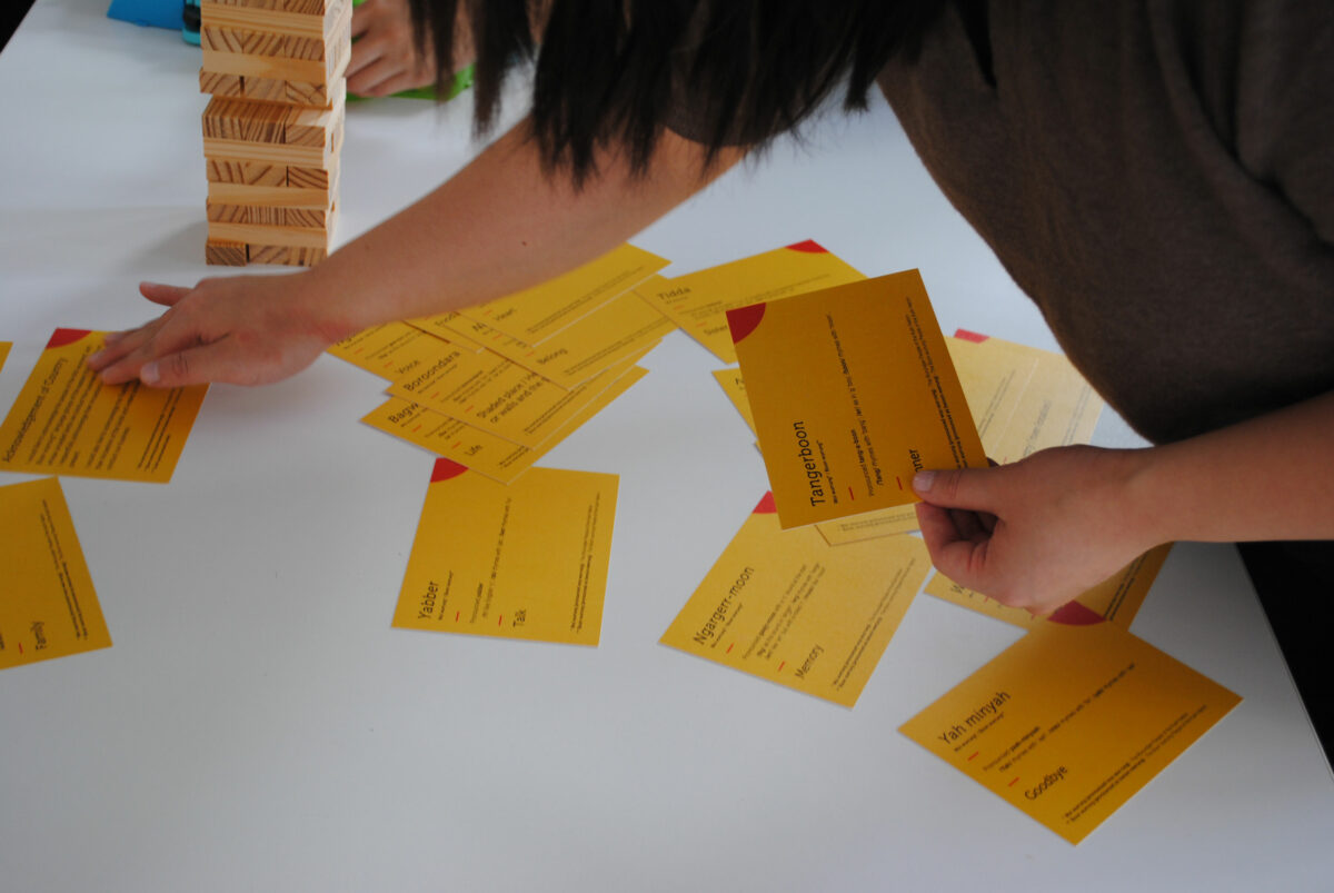 Someone sets up a card game.